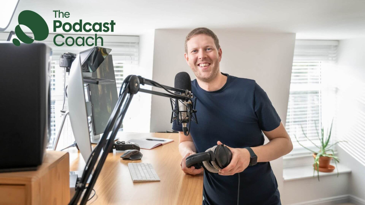 Rory Auskerry at his desk ready to host a podcast.